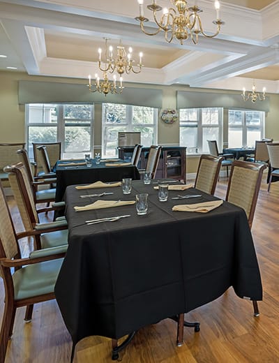 Dining room with tables set for a meal