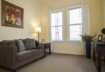 Cozy interior room with a couch and artwork