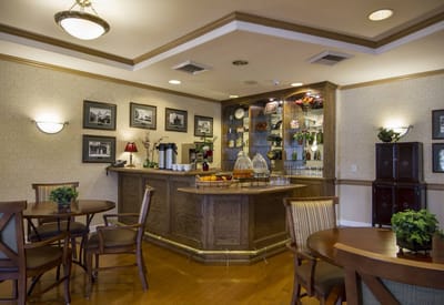 Interior view of a common area with a bar setup