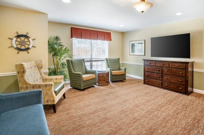 Cozy common area with comfortable seating and a television