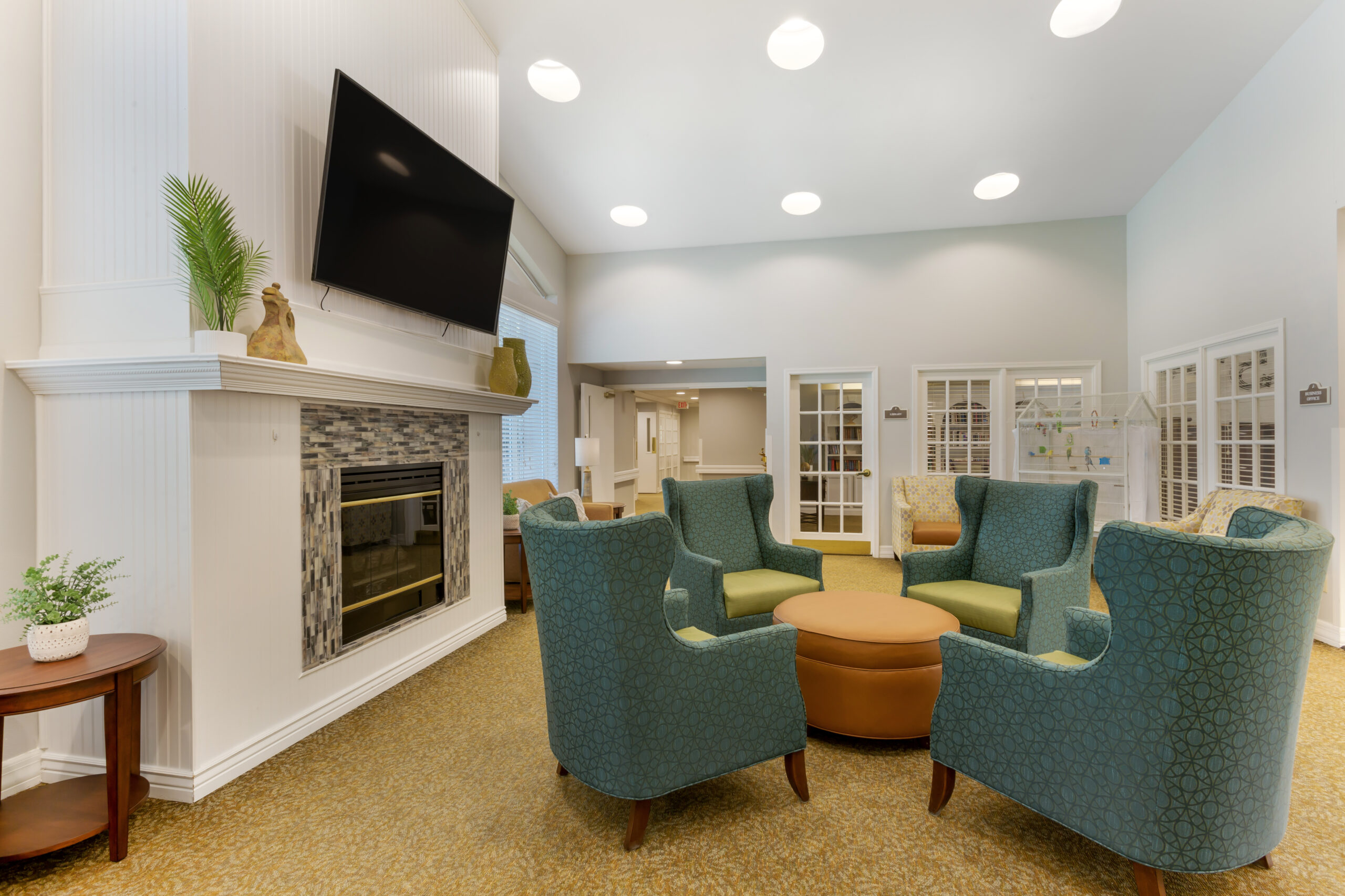 Cozy common area with comfortable seating and a fireplace
