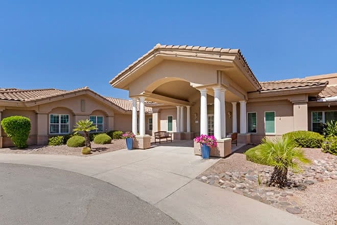 Exterior view of the facility entrance with landscaping