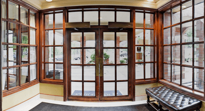 Entrance area with glass doors and seating