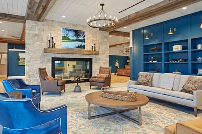 Interior common area with seating and fireplace