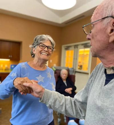 Residents engaging in conversation and enjoying their time together