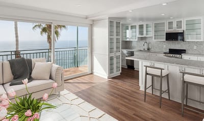 Modern interior view with ocean view balcony