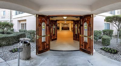 Entrance view of Brookdale Riverwalk with open doors