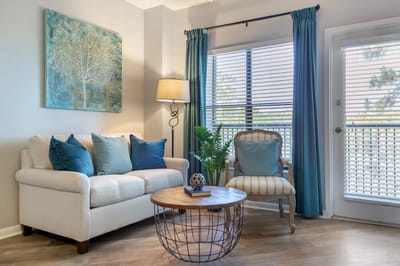 Cozy common area with a couch and decorative art