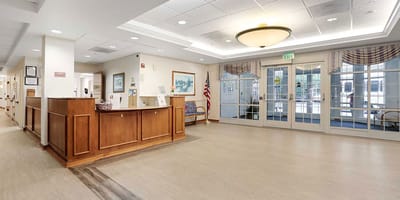Bright interior common area with reception desk