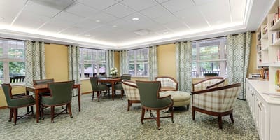 Bright and inviting common area with seating and natural light