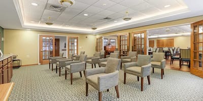 Common area with chairs arranged for an activity