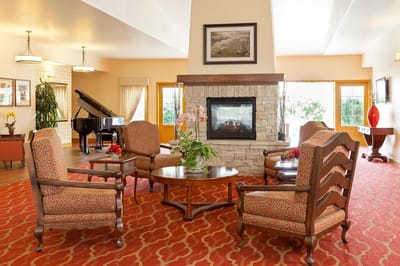 Cozy common area with seating and a fireplace