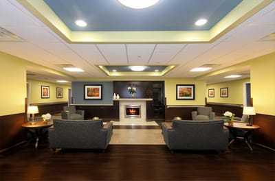 Cozy common area with seating and a fireplace