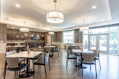 Bright dining room with tables and chairs