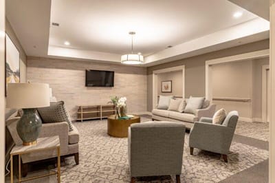 Comfortable lounge area with seating and television