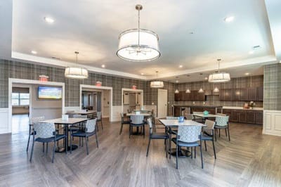 Bright dining area with tables and chairs