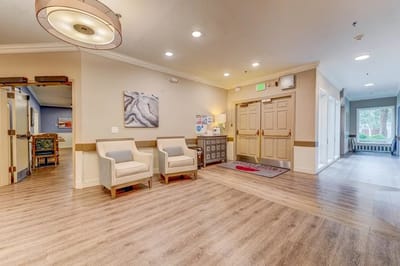 Bright common area with seating and lobby access
