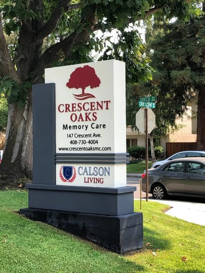 Facility sign for Crescent Oaks Memory Care