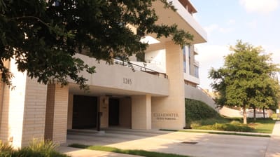 Exterior view of Clearwater facility with guest parking