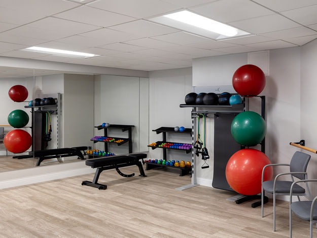 Interior view of a fitness area with workout equipment
