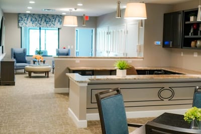 Bright and welcoming common area with seating and decor