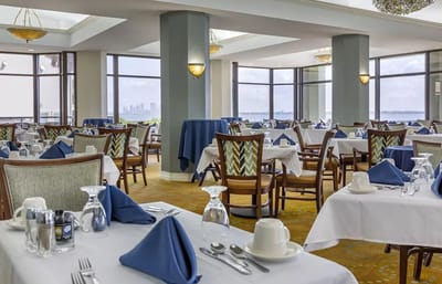 Elegant dining room with neatly set tables