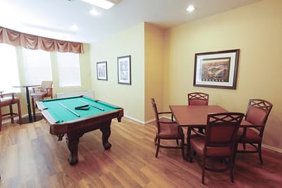 Interior view of a common area with a pool table