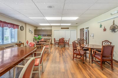 Bright common area with tables and chairs
