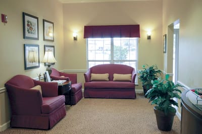 Cozy common area with comfortable seating and plants