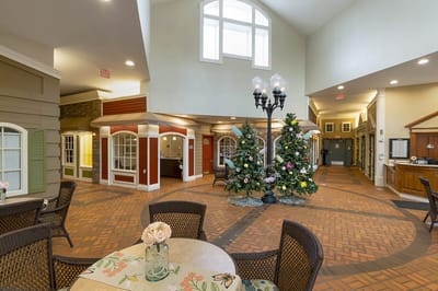 Interior view of a festive common area with decorations
