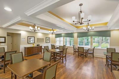 Bright common area with tables and chairs