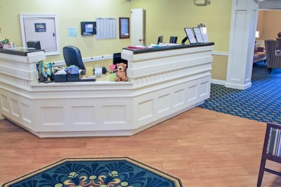Reception area with a welcoming desk and seating