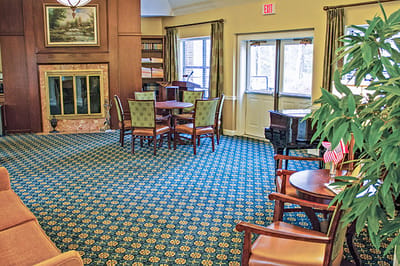 Cozy common area with seating and fireplace