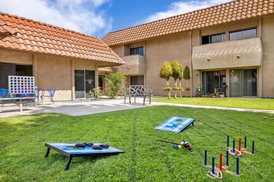 Outdoor space with lawn games and common area