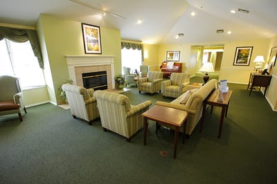 Common area with seating and a fireplace