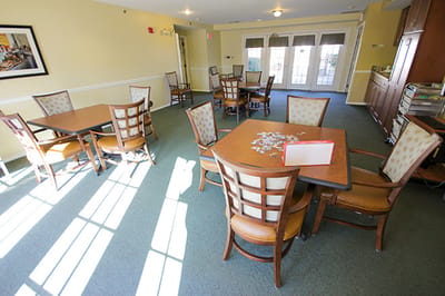 Bright common area with tables and chairs
