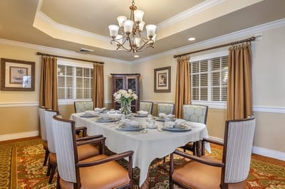 Elegant dining room setup with table settings