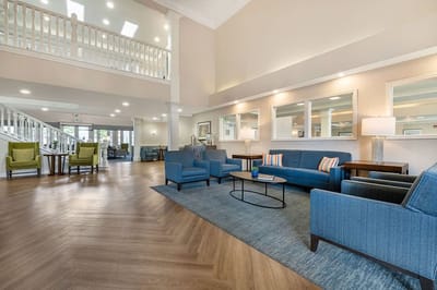 Bright lounge area with comfortable seating and modern decor