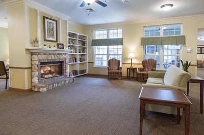 Cozy common area with a fireplace and seating
