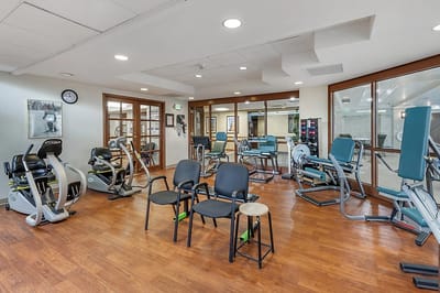 Interior view of a fitness area with exercise equipment