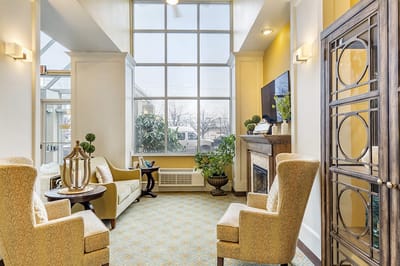 Bright interior lounge with seating and natural light