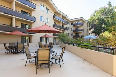 Outdoor seating area with umbrellas and tables