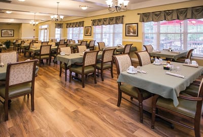 Bright dining area with tables set for meals
