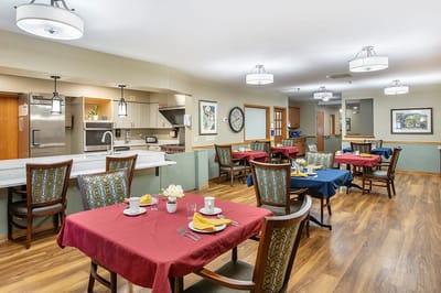 Dining area with tables set for a meal