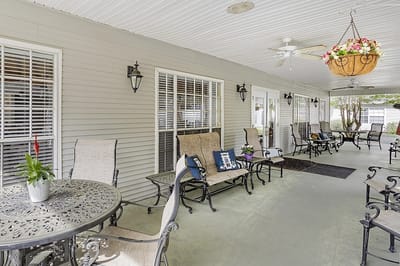 Outdoor seating area with tables and chairs