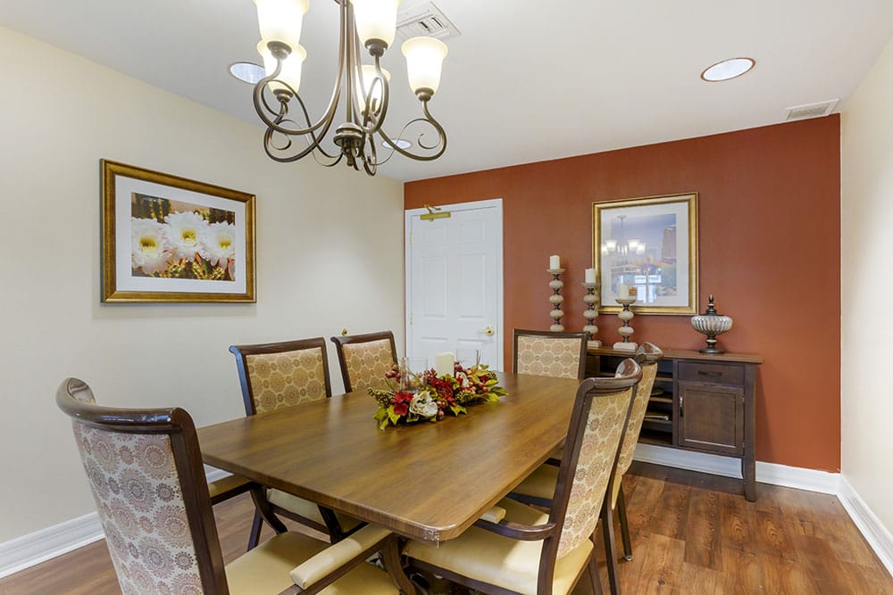 Cozy dining room with a large table and decor