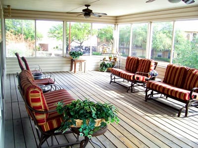 Outdoor seating area with comfortable chairs and plants