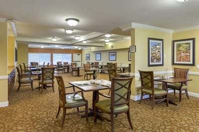 Dining area with tables and chairs set up