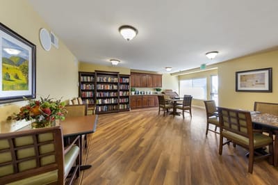 Bright common area with bookshelves and seating