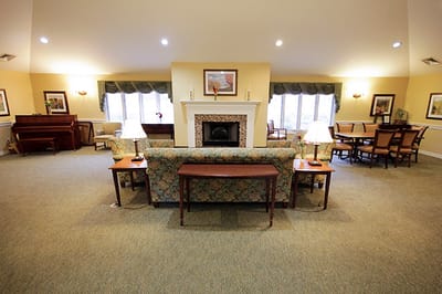 Cozy common area with seating and piano